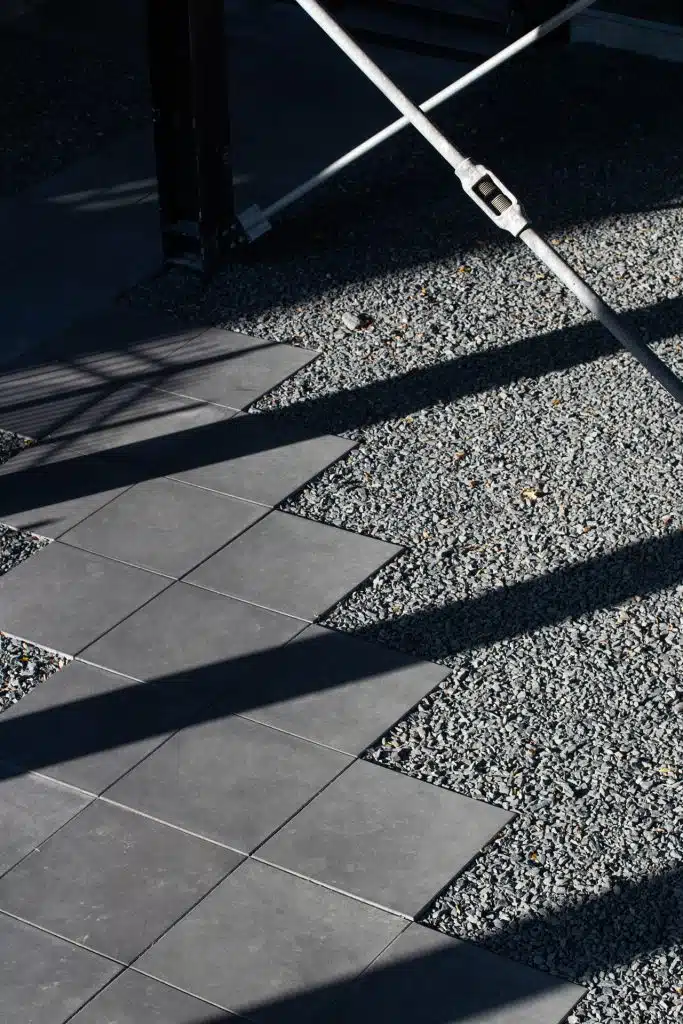 Detail of modern stone pathway for downtown commercial building.