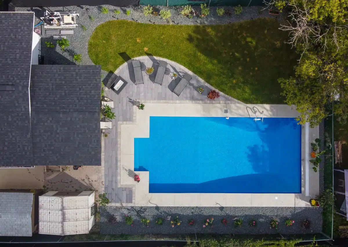 Overhead view of backyard with pool.