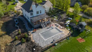Backyard pool patio installation in progress